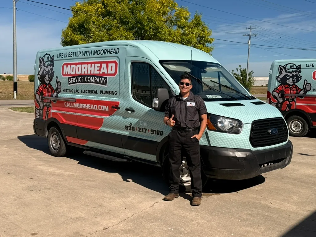 Moorhead Service Company van on the job
